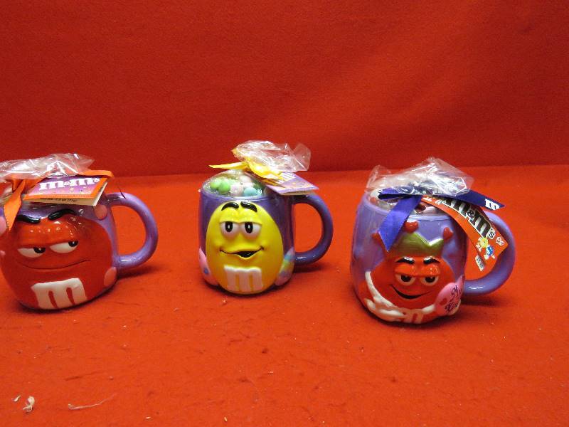 lot 32 image: M&M Collectible Mugs