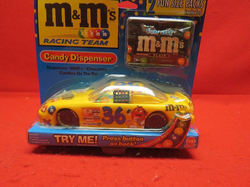 lot 48 image: M&M Collectible #36 Racing Car Candy Dispenser