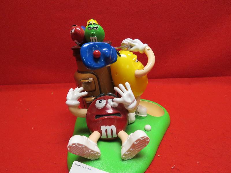 lot 74 image: Collectible M&M Golf Candy Dispenser