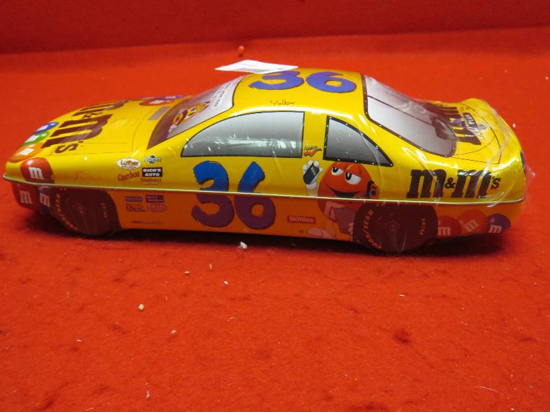lot 91 image: Collectible M&M #36 Race Car Tin