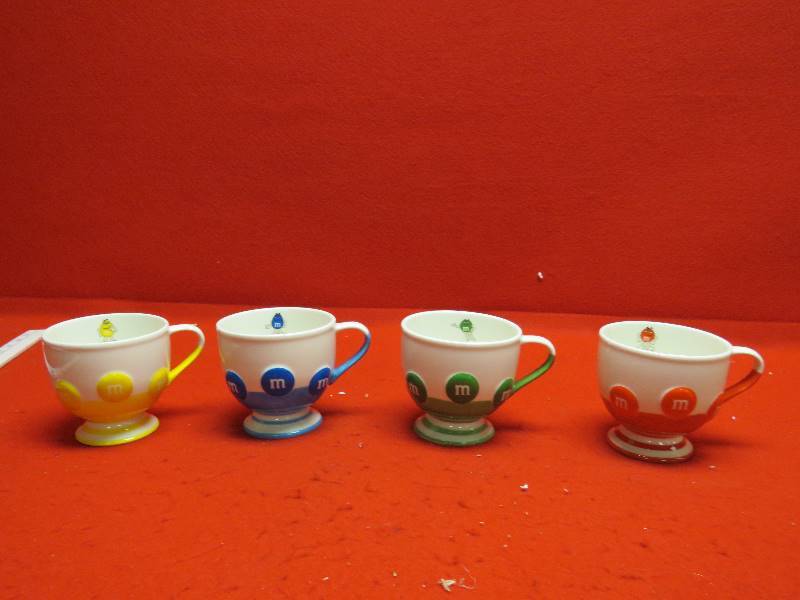 lot 94 image: Collectible M&M Mugs