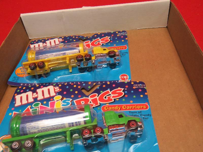 lot 128 image: M&M Collectible Mini Rigs Candy Carriers