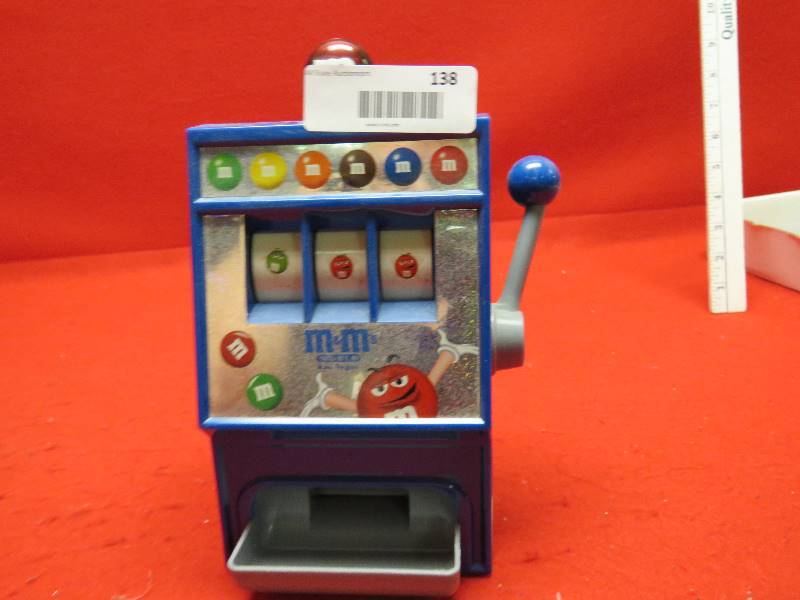 m m dispenser old slot machine