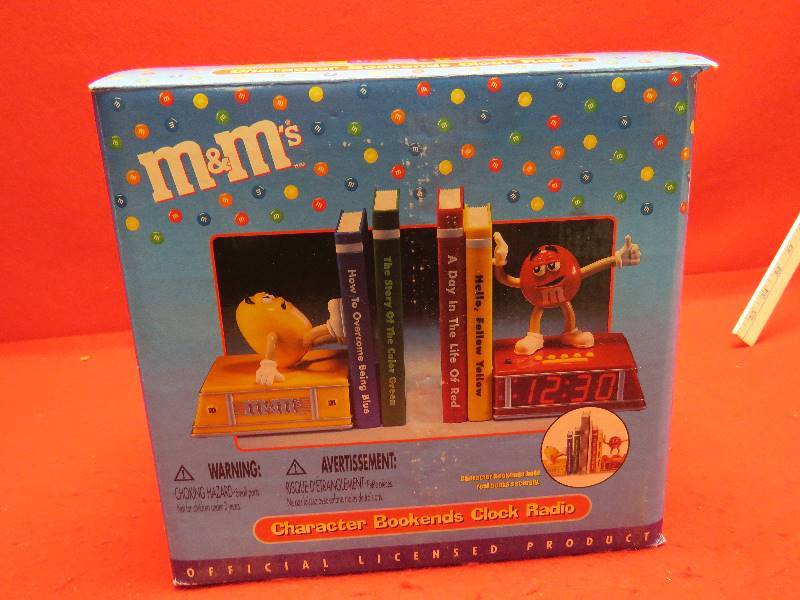 lot 152 image: M&M Collectible Character Bookends Clock Radio