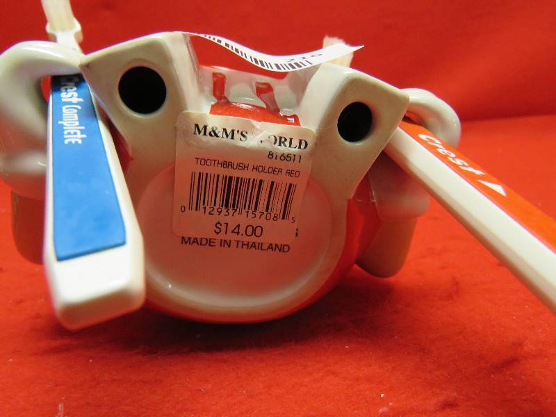 lot 216 image: M&M Collectible Tooth Brush Holder