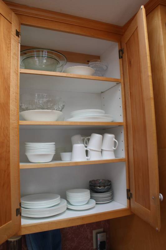 lot 56 image: Cupboard Lot of Dishware