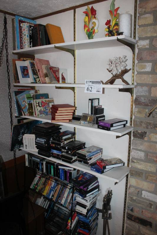 lot 62 image: Shelf Lot w Movie Stand Including Table Decorations, Books, And More