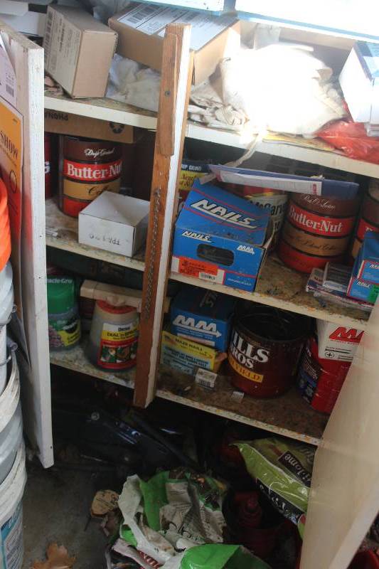 lot 141 image: Contents of Cabinet Including Hardware, Yard Supplies, And More
