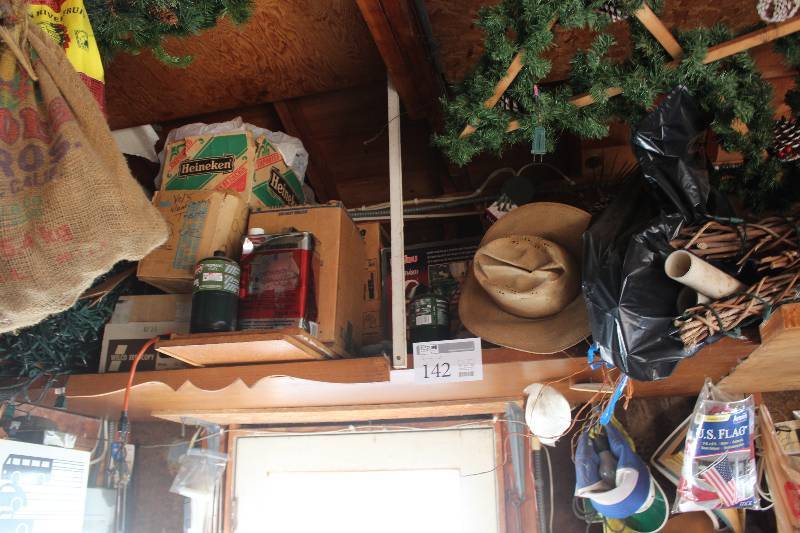 lot 142 image: Shelf Lot Including Christmas Decorations, Propane Tank, Gas Can, And More