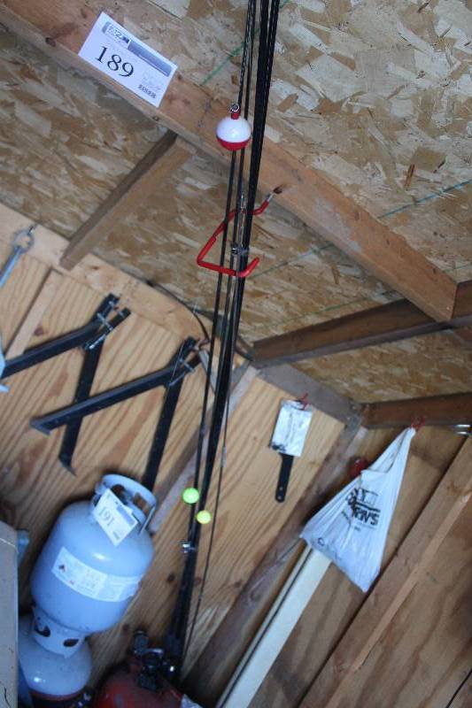 lot 189 image: Lot of Fishing Equipment Includes Poles, Nets, And More