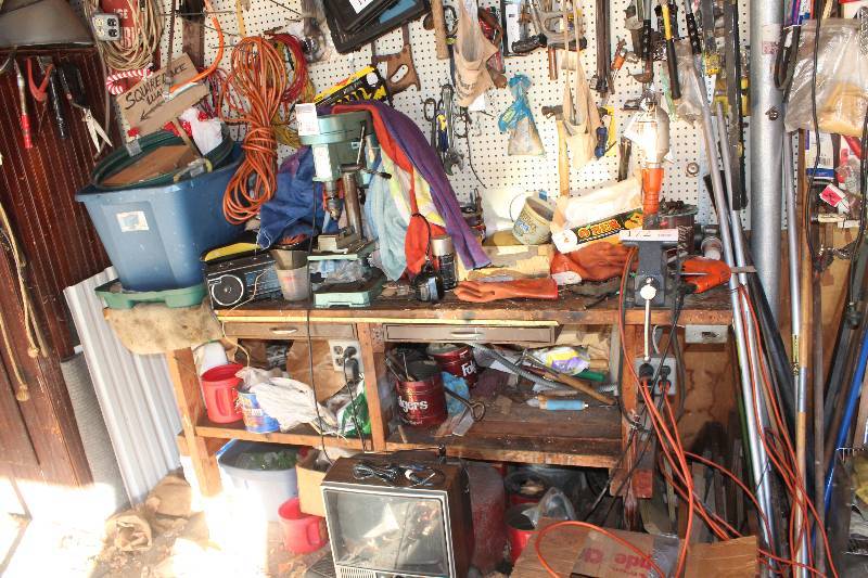 lot 172 image: Contents of Desk w Vice Includes Tools, Hardware, And More