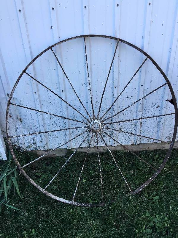 lot 217 image: two antique wagon wheels