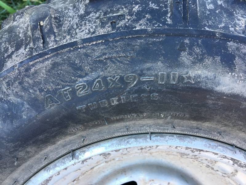 lot 230 image: four atv tires at24x9-11