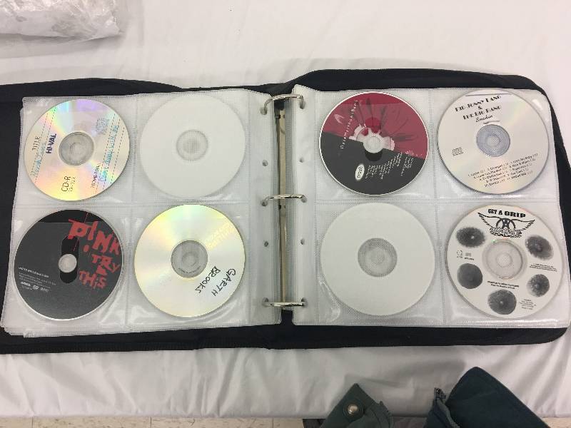 lot 10 image: case full of cds