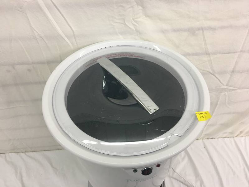 lot 134 image: brookstone towel warmer  has crack in lid doesnt affect use