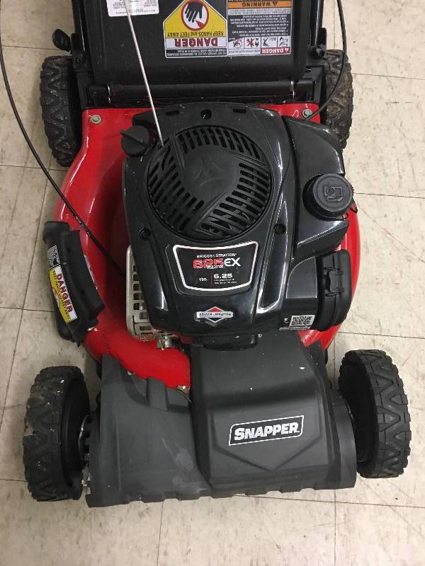 lot 129 image: Snapper 21 Self Propelled Gas Mower with Side Discharge, Mulching, Rear Bag retail $399