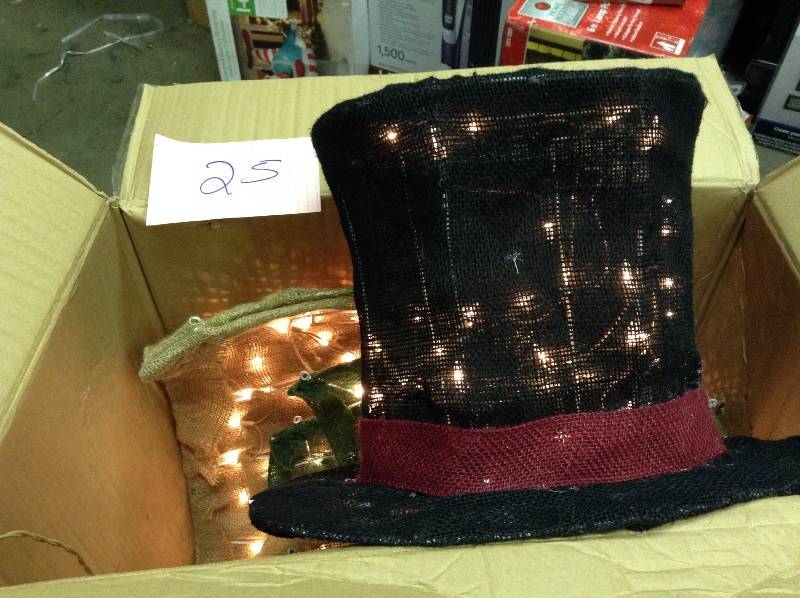 lot 25 image: Home Accents 5 ft. Pre-Lit Burlap Snowman in Coat and Mittens