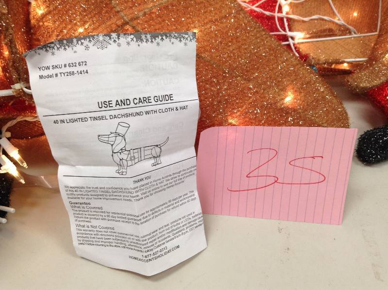 lot 35 image: Lighted Tinsel Dachshund Dog In Soldier Uniform Christmas Indoor Outdoor Dcor