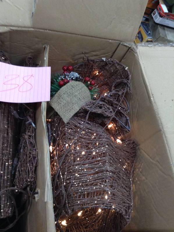 lot 38 image: 5 ft. PreLit PVC Grapevine Standing Deer with 44 in. Sleigh