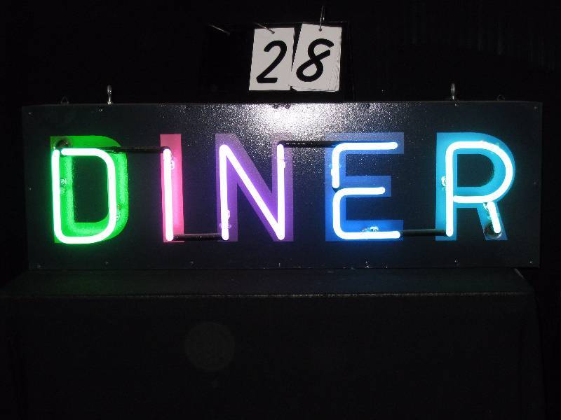 lot 28 image: Diner multi colored neon. Neon letters are each a different color.