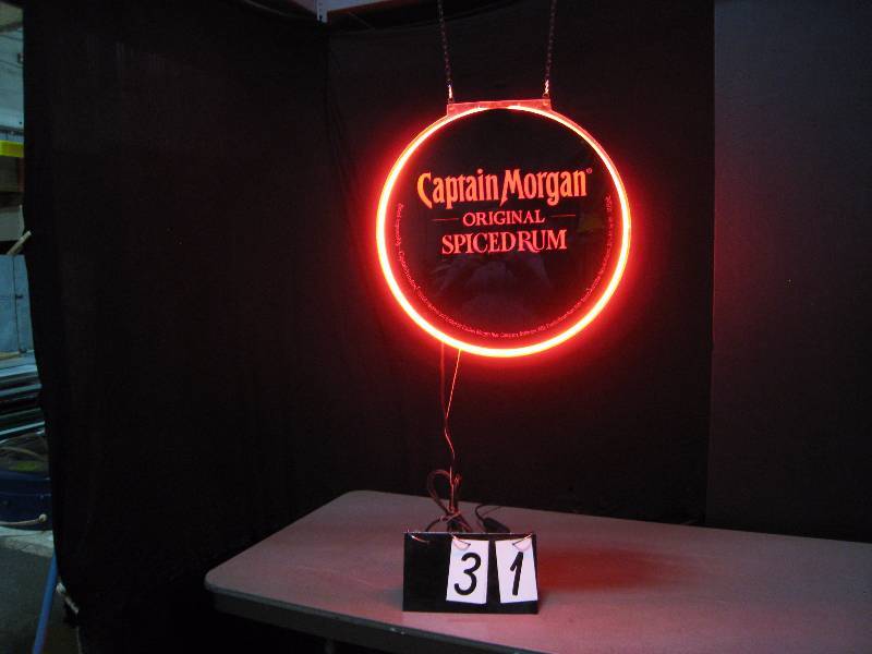 lot 31 image: Captain Morgan backlit plastic with neon, two-sided.