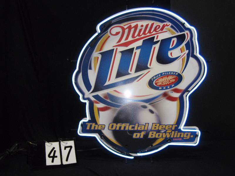 lot 47 image: Miller Lite Official Beer of Bowling neon and tin sign.