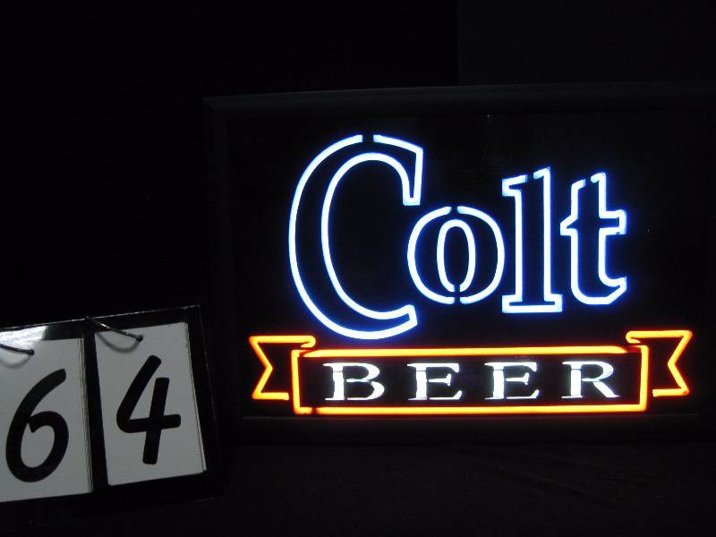 lot 64 image: Colt Beer neon-like, plate glass light up sign.