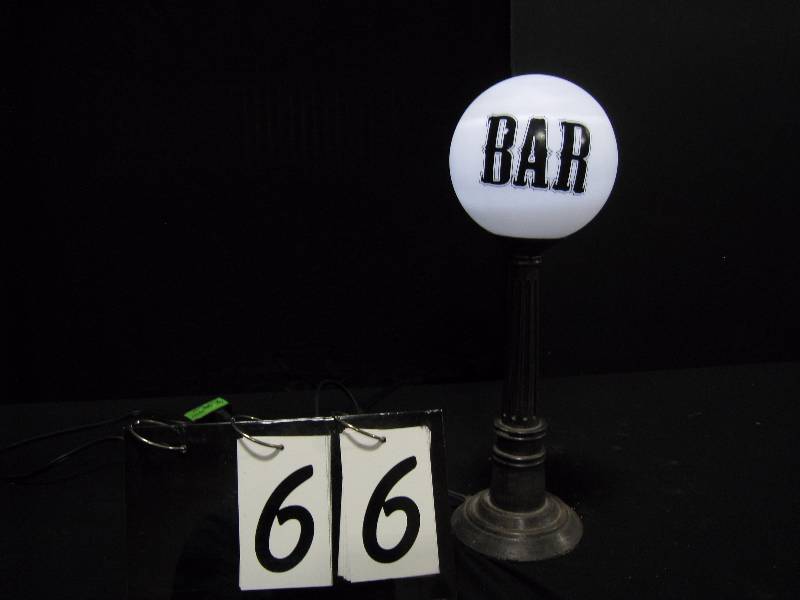 lot 66 image: Bar globe desk lamp, looks like a street light.