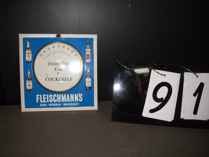 lot 91 image: Fleischmanns Enjoy Fine Cocktails, painted tin thermometer, excellent condition