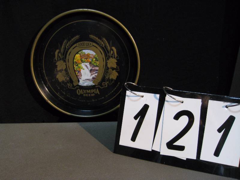 lot 121 image: Olympia Beer tray, back is black