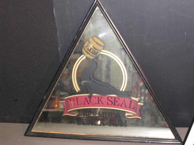 lot 156 image: Black Seal Rum mirror. Cool. Unusual shape for a mirror.