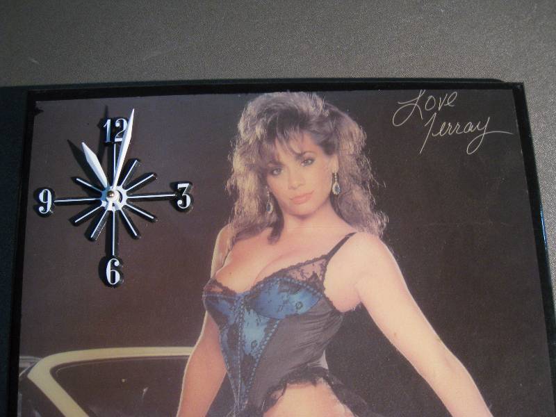 lot 163 image: Signed Girlie clock. Dont know if the clock works, and dont care - look at those legs.