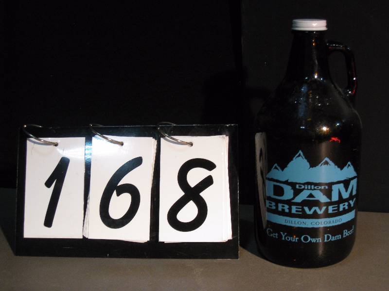 lot 168 image: Dillon Dam Brewery, glass growler 64 oz