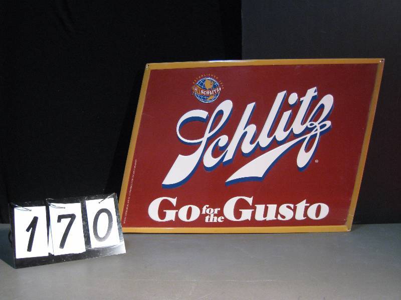 lot 170 image: Schlitz tin tacker sign