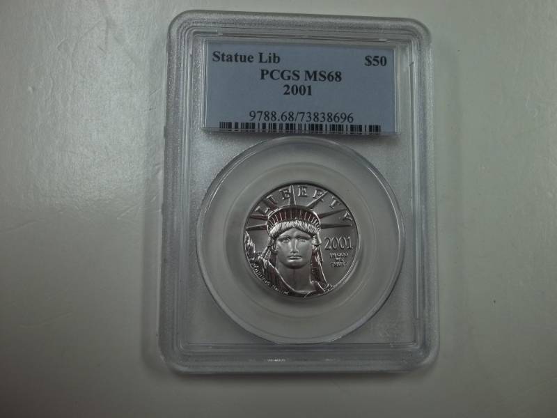 lot 1 image: Platinum $50 2001 Eagle MS 68 12 oz. Platinum .9999