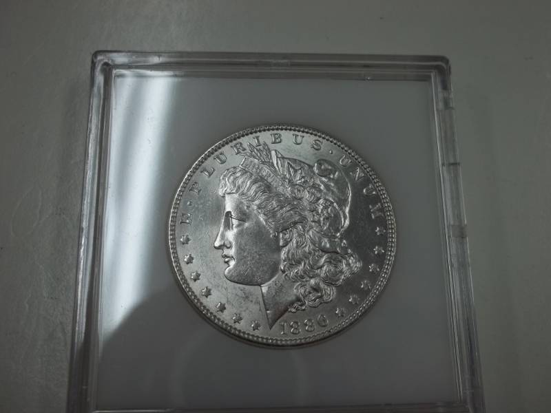 lot 18 image: 1886 Morgan Silver Dollar 90% Silver in case