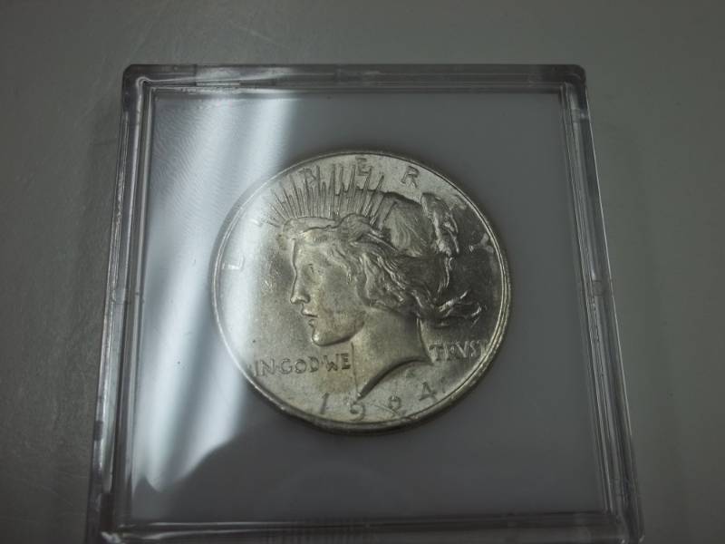 lot 21 image: 1924 Peace Silver Dollar 90% Silver in case