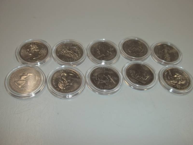 lot 52 image: 10 Assorted State Quarters in cases