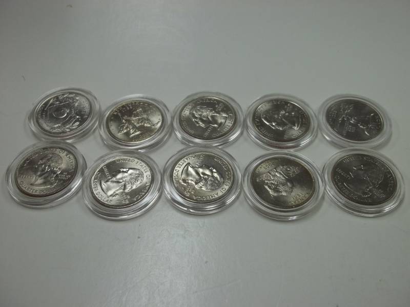lot 54 image: 10 Assorted State Quarters in cases