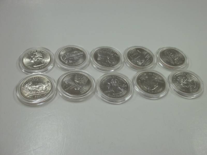 lot 56 image: 10 Assorted State Quarters in cases