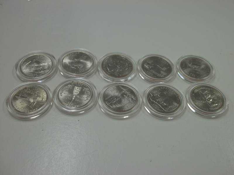 lot 57 image: 10 Assorted State Quarters in cases