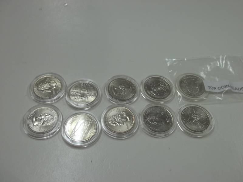 lot 58 image: 10 Assorted State Quarters in cases