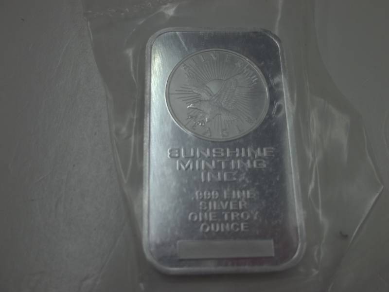 lot 65 image: One Troy Silver Sunshine Minting Inc. .999%