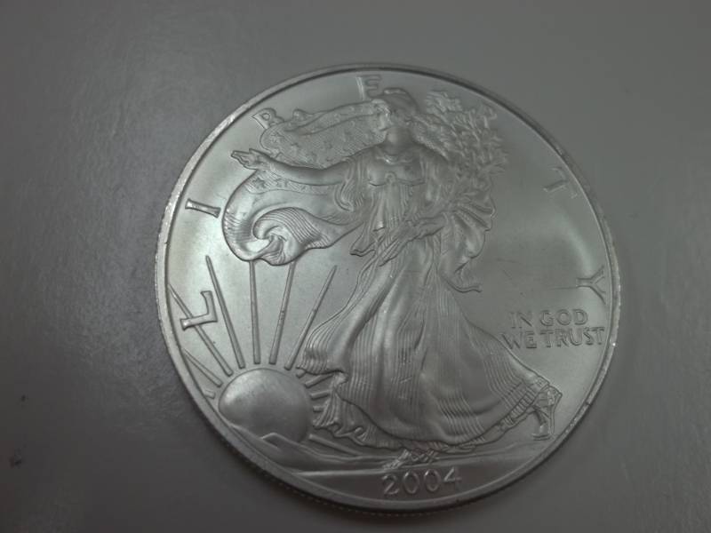 lot 95 image: Silver American Eagle 1 Oz. Fine Silver Year 2004 Coin