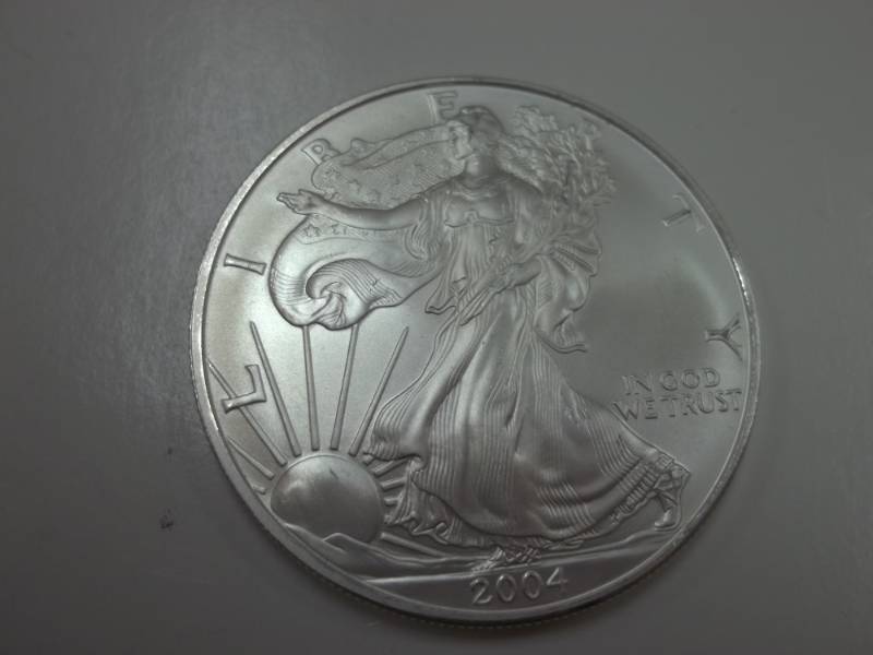 lot 96 image: Silver American Eagle 1 Oz. Fine Silver Year 2004 Coin