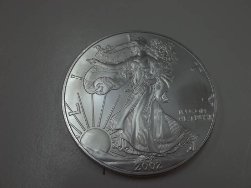 lot 97 image: Silver American Eagle 1 Oz. Fine Silver Year 2002 Coin