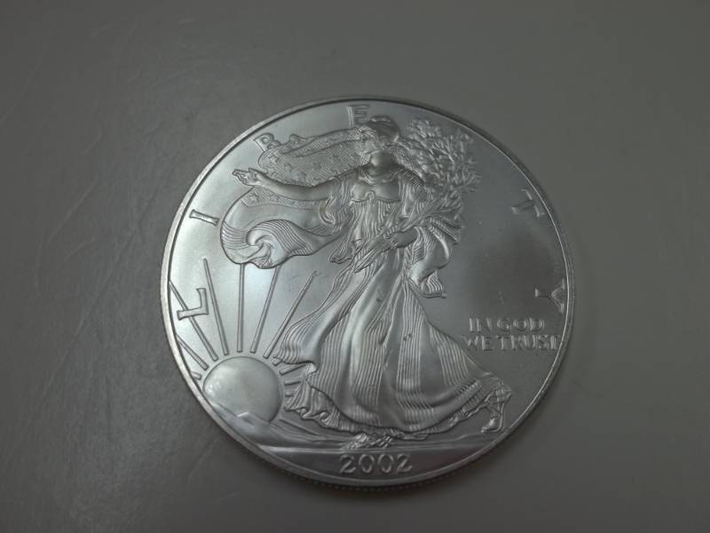 lot 98 image: Silver American Eagle 1 Oz. Fine Silver Year 2002 Coin