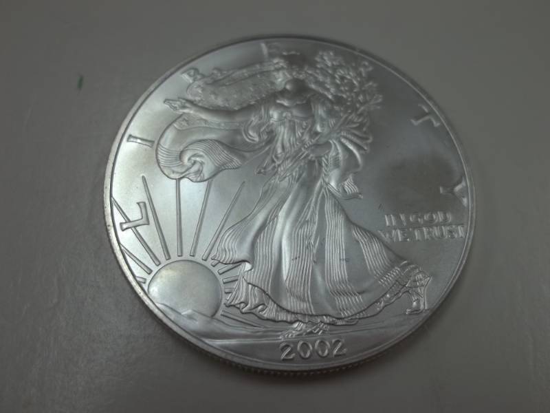 lot 103 image: Silver American Eagle 1 Oz. Fine Silver Year 2002 Coin