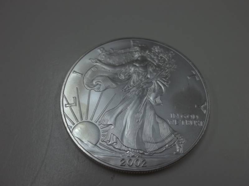 lot 104 image: Silver American Eagle 1 Oz. Fine Silver Year 2002 Coin