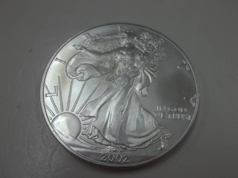 lot 106 image: Silver American Eagle 1 Oz. Fine Silver Year 2002 Coin